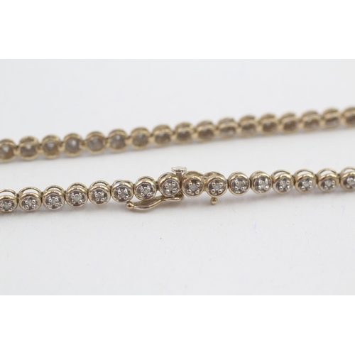 1 - 9ct gold diamond set tennis bracelet (5.8g)