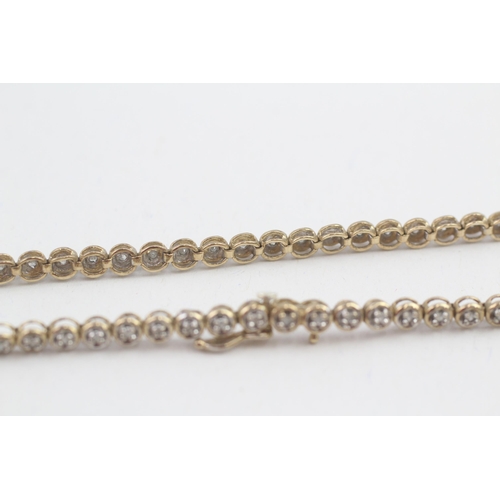 1 - 9ct gold diamond set tennis bracelet (5.8g)