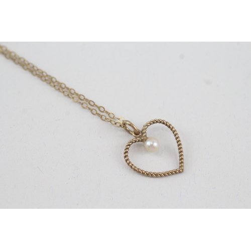 43 - 9ct gold cultured pearl heart shaped pendant necklace (2.1g)