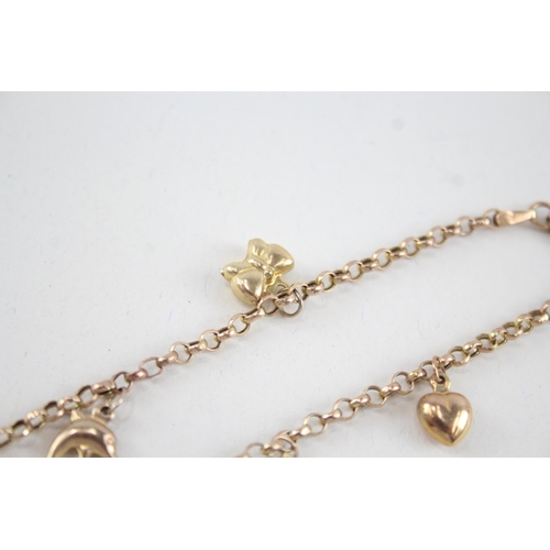 48 - 9ct gold belcher charm bracelet including a moon, sun, bear & heart charm (3.4g)