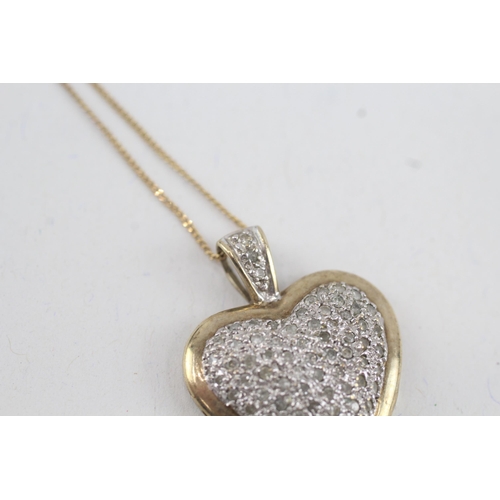 49 - 9ct gold parve set heart shape pendant necklace (3.6g)