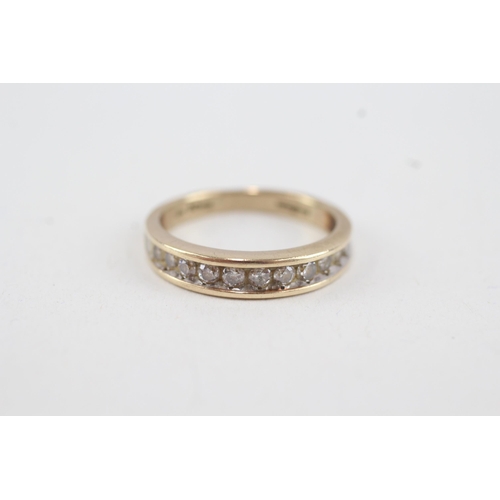 50 - 9ct gold diamond half eternity ring, total diamond weight 0.50ct approximately, channel set (3.1g) S... 