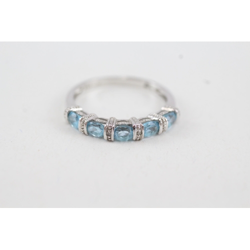 54 - 9ct gold blue gemstone & diamond half eternity ring (2.1g) Size  O 1/2