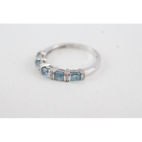 54 - 9ct gold blue gemstone & diamond half eternity ring (2.1g) Size  O 1/2