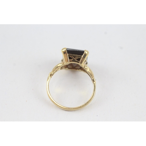 61 - 9ct gold vintage smokey quartz dress ring (2.7g) Size  M