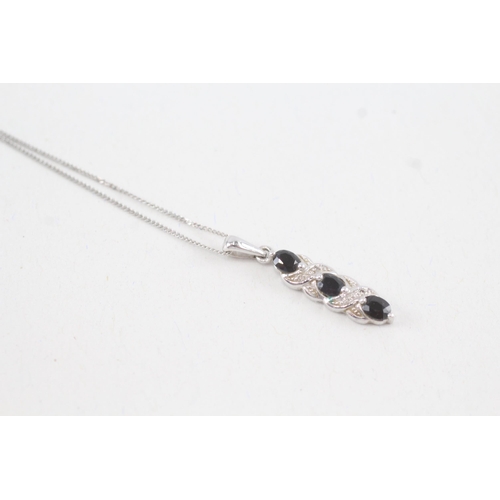 77 - 9ct white gold sapphire & diamond drop pendant necklace (2.1g)