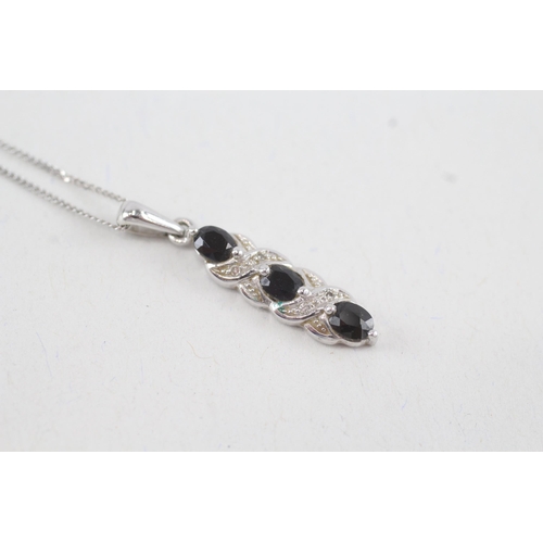 77 - 9ct white gold sapphire & diamond drop pendant necklace (2.1g)