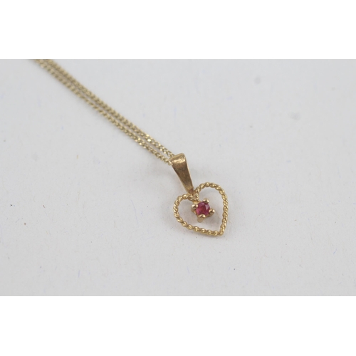 79 - 9ct gold ruby heart shaped pendant necklace (1.5g)