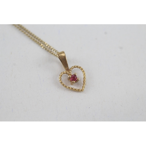 79 - 9ct gold ruby heart shaped pendant necklace (1.5g)