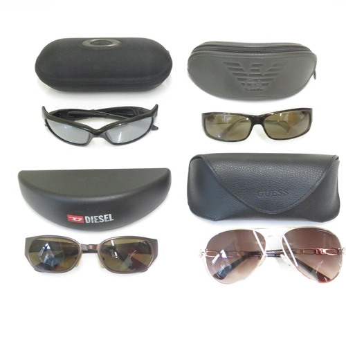 519 - 4 x Designer Sunglasses including Oakley, Emporio Armani, Guess, Diesel  - All with Cases