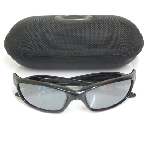 519 - 4 x Designer Sunglasses including Oakley, Emporio Armani, Guess, Diesel  - All with Cases