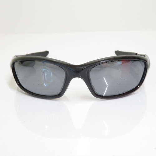 519 - 4 x Designer Sunglasses including Oakley, Emporio Armani, Guess, Diesel  - All with Cases