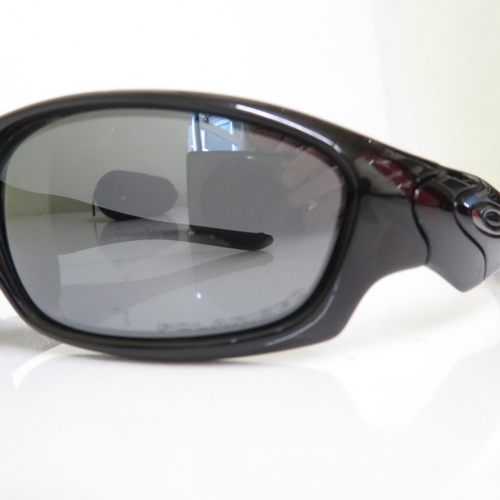 519 - 4 x Designer Sunglasses including Oakley, Emporio Armani, Guess, Diesel  - All with Cases