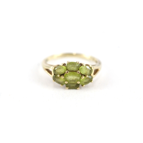 103 - 9ct gold peridot seven stone cluster ring (3.1g) Size  R