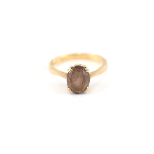 105 - 9ct gold oval smokey quartz single stone ring (2.3g) Size  N