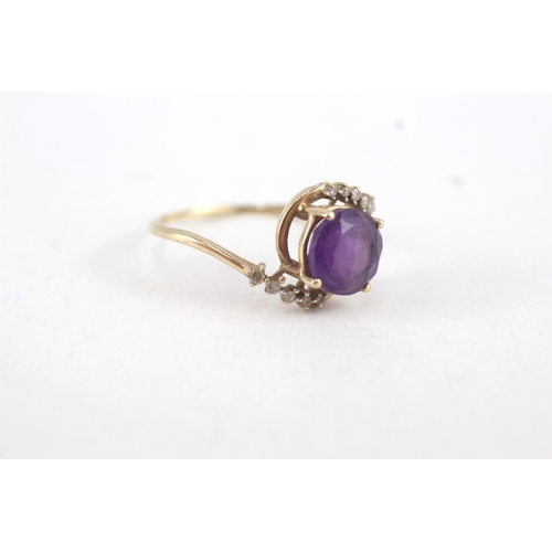 108 - 9ct gold round amethyst single stone ring with diamond surround (2.1g) Size  Q