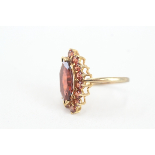 113 - 9ct gold garnet marquise cluster ring (3.7g) Size  Q