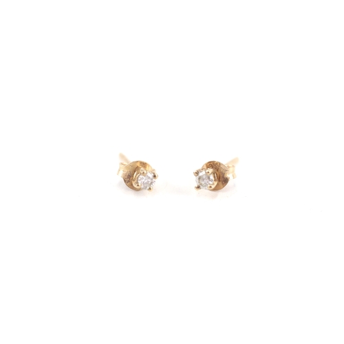 118 - 9ct gold round diamond single stone stud earrings (0.5g)