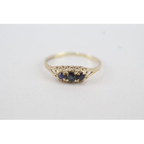 20 - 9ct gold sapphire three stone ring (1g) Size  N