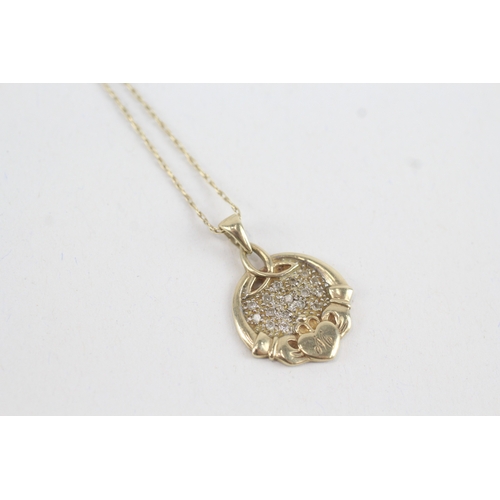 205 - 9ct gold diamond claddagh pendant necklace (3.2g)