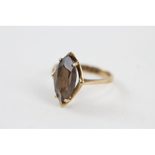 27 - 9ct gold marquise smokey quartz single stone ring (2.8g) Size  P 1/2