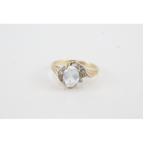 54 - 9ct gold aquamarine single stone ring with diamond surround (2g) Size  N