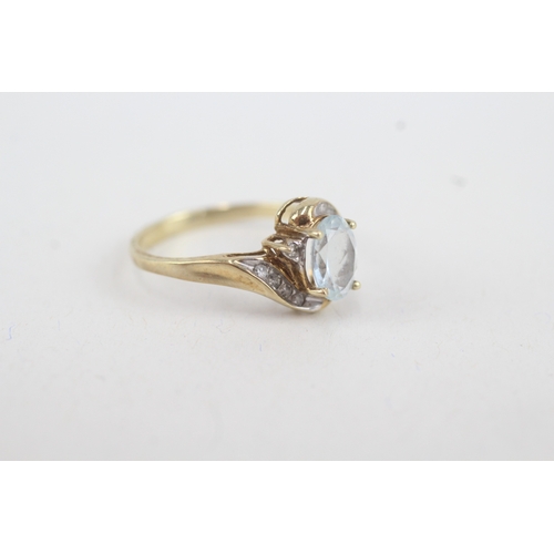 54 - 9ct gold aquamarine single stone ring with diamond surround (2g) Size  N