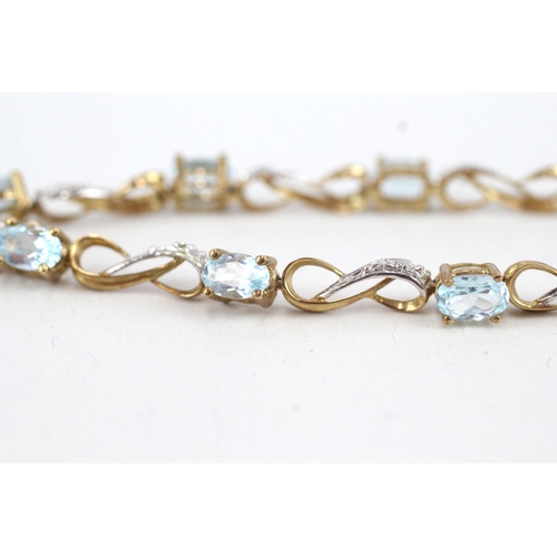 56 - 9ct gold diamond & topaz fancy link bracelet (5.8g)