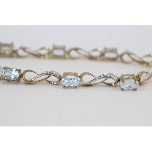 56 - 9ct gold diamond & topaz fancy link bracelet (5.8g)