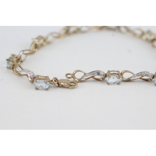 56 - 9ct gold diamond & topaz fancy link bracelet (5.8g)