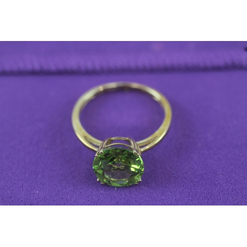 61 - 9ct gold peridot single stone ring with certificate (1.7g) Size  M 1/2