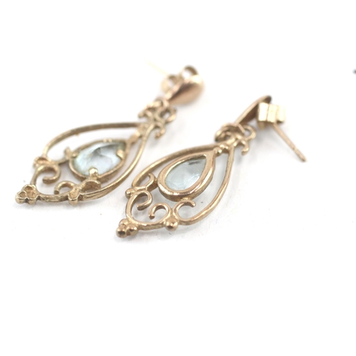 67 - 9ct gold topaz openwork drop earrings (1.4g)