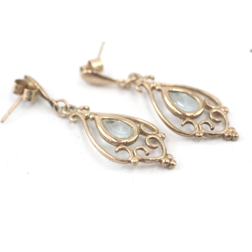 67 - 9ct gold topaz openwork drop earrings (1.4g)