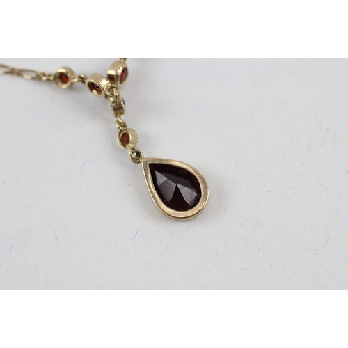 7 - 9ct gold garnet drop necklace with integral chain (6.2g)