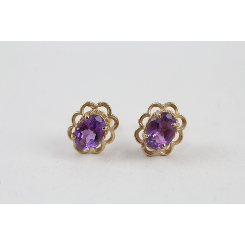 8 - 9ct gold amethyst single stone stud earrings (1.4g)