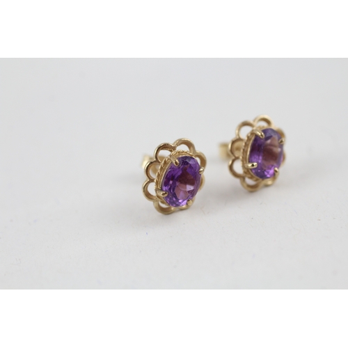 8 - 9ct gold amethyst single stone stud earrings (1.4g)