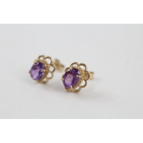 8 - 9ct gold amethyst single stone stud earrings (1.4g)