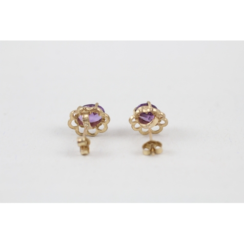 8 - 9ct gold amethyst single stone stud earrings (1.4g)