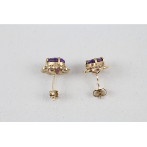 8 - 9ct gold amethyst single stone stud earrings (1.4g)