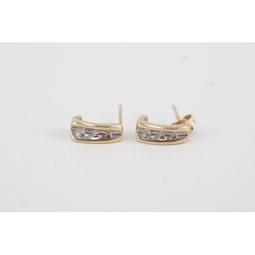 86 - 9ct gold diamond half hoop earrings (1.2g)