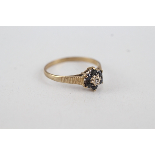 88 - 9ct gold diamond & sapphire floral cluster ring (1.3g) Size  N