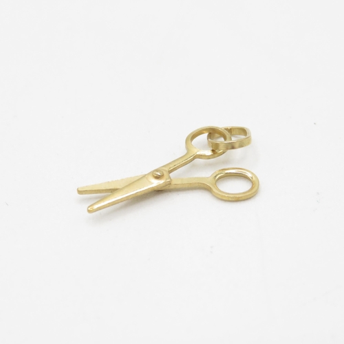 276 - 9ct gold articulated scissor charm (0.5g)