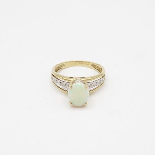 281 - 9ct gold opal & diamond dress ring (2.7g) Size  N