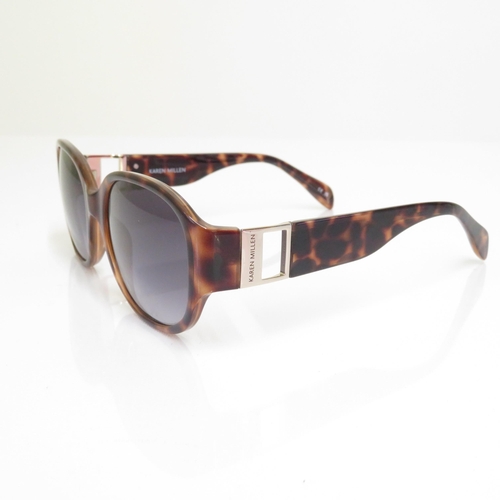 463 - 6 x Designer Sunglasses including Prada / Versace / Guess / Karen Millen / Tommy Hilfiger