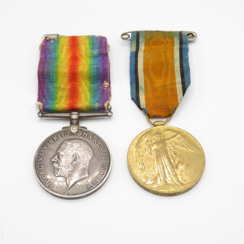 404 - WWI medal pair named 265715 Pte. G. Lomas Cheshire Regt.