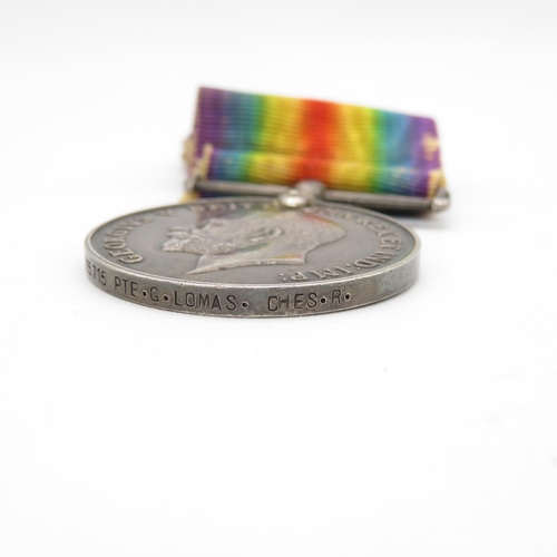 404 - WWI medal pair named 265715 Pte. G. Lomas Cheshire Regt.