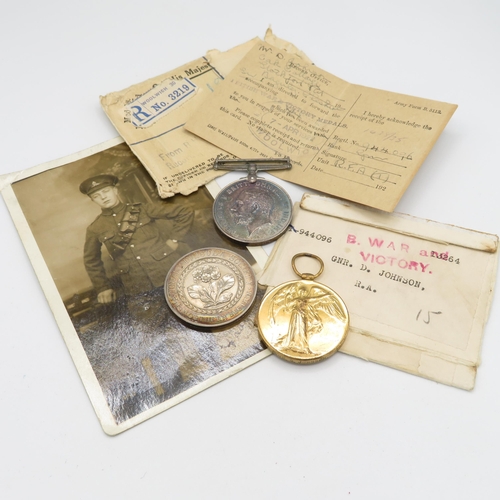 409 - WWI medal pair and sterling silver Auricula Society medal etc.  WWI Pair names 944096 Gnr. D. Johnso... 