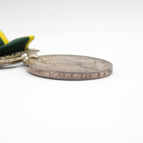 412 - WWII Territorial boxed medal group and postal packet.  Territorial named 1474920 CFN M.A. Forrest R.... 