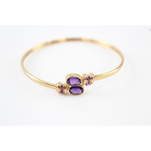 10 - 9ct gold amethyst bypass bangle (7.7g)