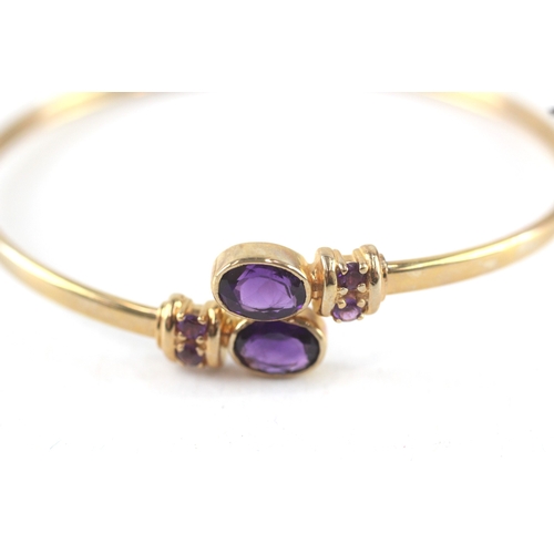 10 - 9ct gold amethyst bypass bangle (7.7g)